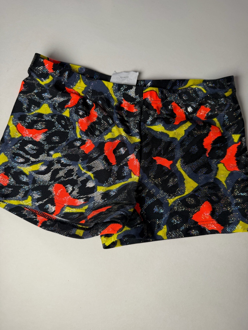 Kids Black Swim Shorts with Neon Red & Yellow Abstract Print